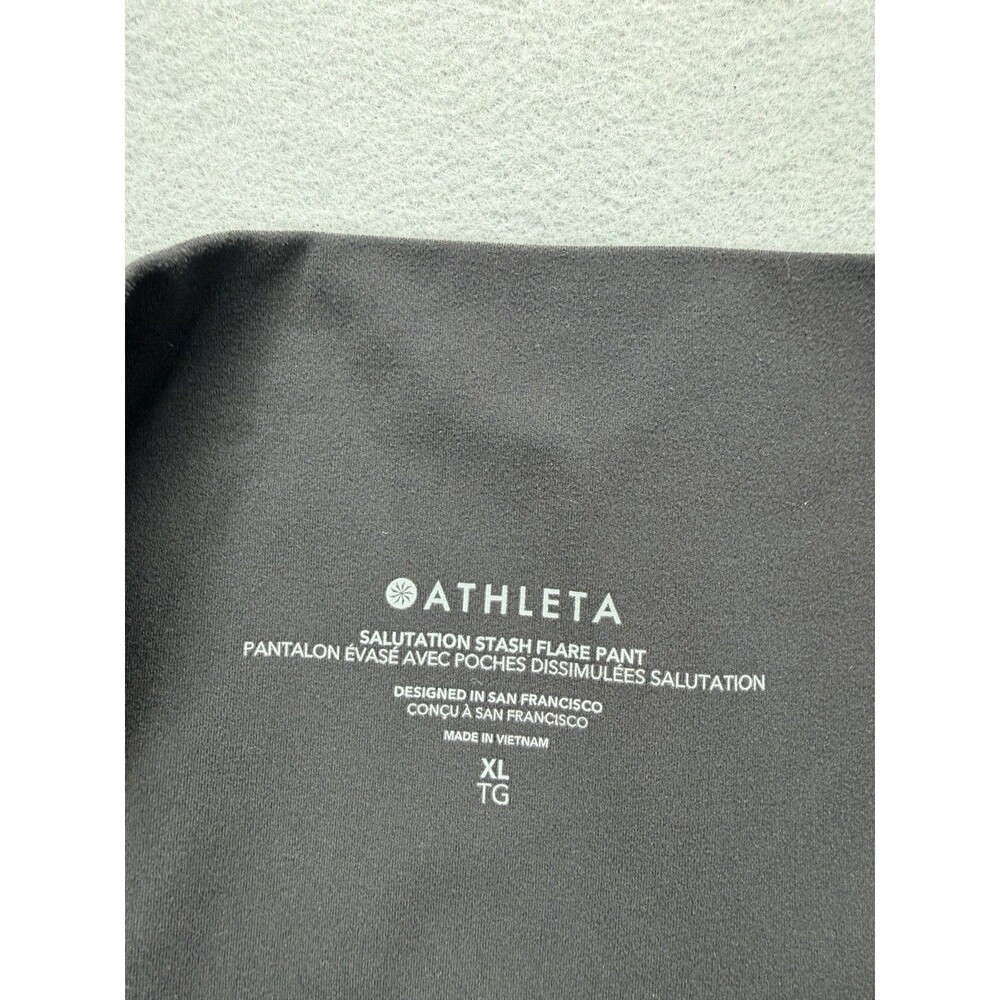 Athleta Salutation Stash Flare Pant XL Black Yoga Leggings Pockets Stretch - Picture 9 of 14
